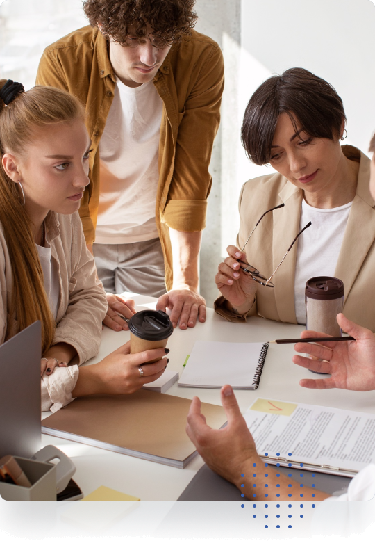 Image of a work meeting where two women and a man appear
